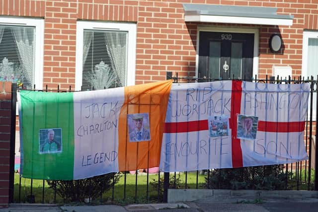 Flags outside houses in Ashington, Northumberland, ahead of Jack Charlton’s funeral procession through his hometown