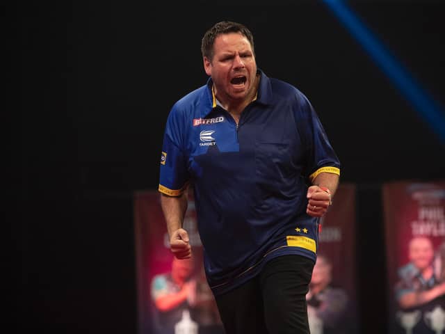 Adrian Lewis won an 11-9 nailbiter at the Betfred World Matchplay  Picture: LAWRENCE LUSTIG / PDC