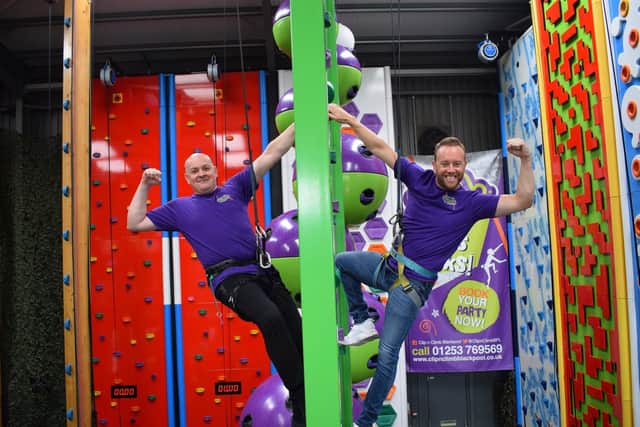 Dan Whiston, right, and Clip and Climb manager John Irving test out the equipment ahead of the venue's reopening on July 25