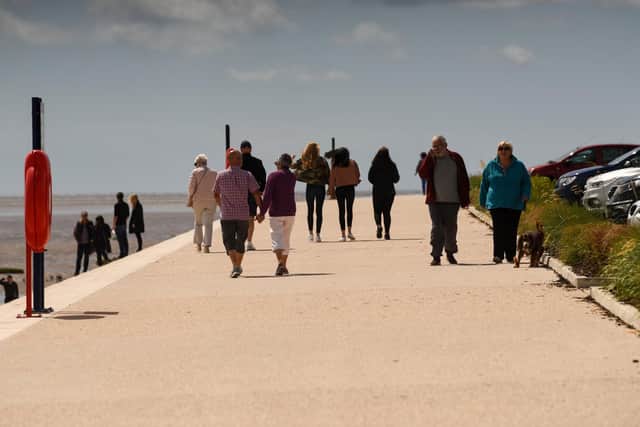 The sea defences are a popular spot for a scenic stroll