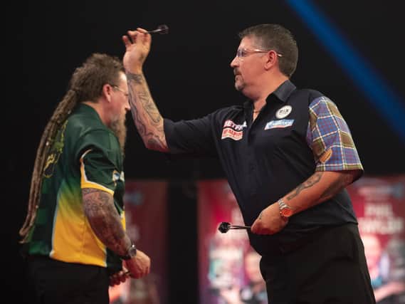 Gary Anderson saw off Simon Whitlock on Thursday evening
