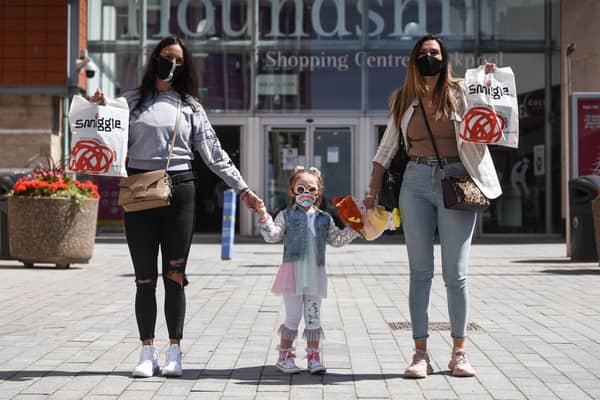 Storm Oresanya with Tara Wyles and 2-year-old Lexi Wyles.