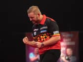 Dimitri van den Bergh edged out Glen Durrant on Saturday night