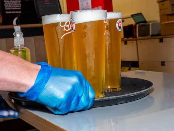 Pubs have to follow guidelines to keep customers and staff safe during the pandemic - with those who flout the rules at risk of being ordered to close by the council