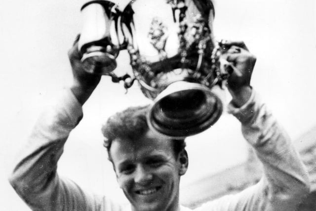 Billy Bremner lifts the League Cup in 1968 after Leeds United beat Arsenal at Wembley. Terry Cooper scored the winning goal.