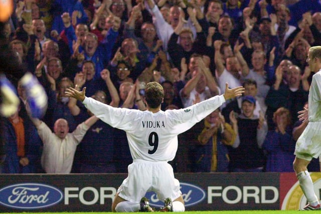 Mark Viduka celebrates with fans after scoring in the 6-0 Champions League demolition of Besiktas at Elland Road in September 2000.