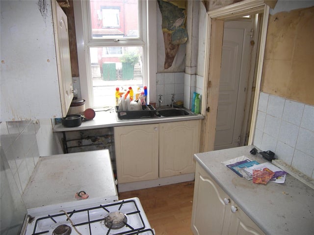 The galley kitchen is in need of some TLC