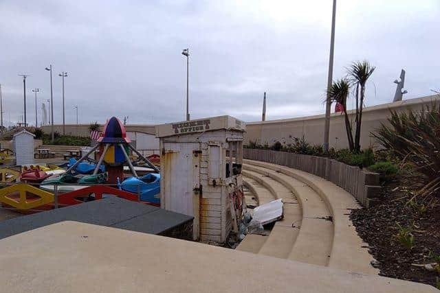 Looking over the sea wall at Jubilee Beach, visitors can see litter and damage to the ticket office at Kiddies Corner in Cleveleys.