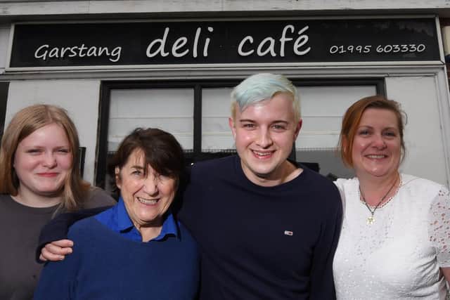 Gwen pictured with family members who work with her at the cafe - Beth Robinson, Ryan Dunn and Jane Robinson.