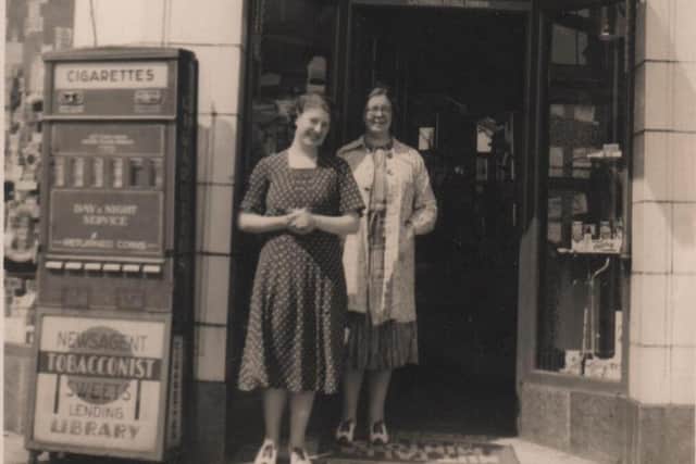 Margery (left) and Joan Barrow outside their newsagents shop at Cheery Corner, Fleetwood