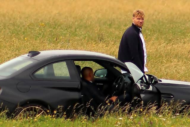 Presenters Andrew 'Freddie' Flintoff and Chris Harris take a break from filming Top Gear at Blackpool Airport today. Pic: Paul Webster