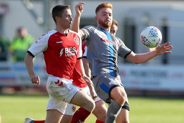 Callum Camps (right) in action for Rochdale against Fleetwood last season