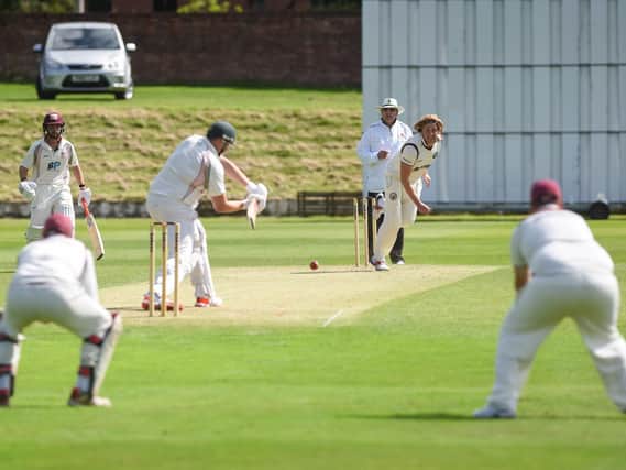 Thomas Hessey bowls for Lytham in their defeat at Blackpool  Picture: DANIEL MARTINO
