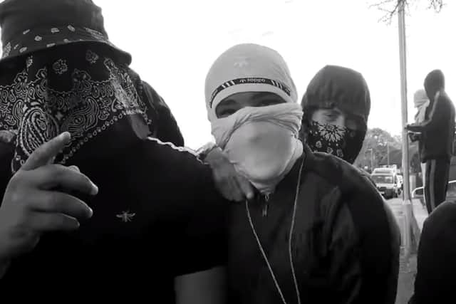 Gang made a rap video featuring police raid