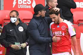 Lewie Coyle alongside Joey Barton after being sent off in the play-offs.