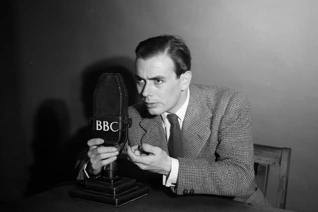 Radio actor Gordon Davies, the new Dick Barton, clutches the BBC microphone during an exciting part of the series. Photo:Getty Images
