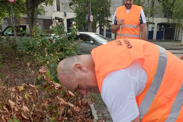 Tyson Fury films his dad weeding in Morecambe.