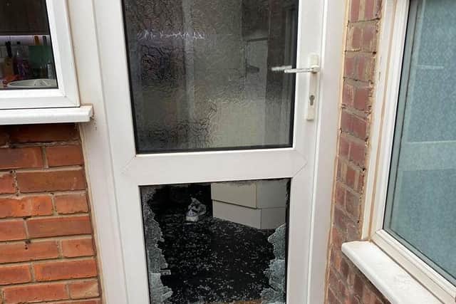 The smashed glass panel at Sean McGann's home