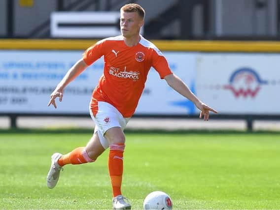 Calum Macdonald will link up with his former Blackpool captain Jay Spearing and coach Ian Dawes at Tranmere