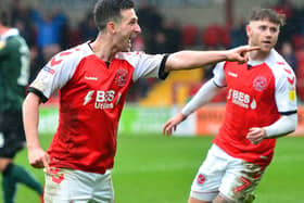 Loanee Jason Holt celebrates scoring for Fleetwood Town against Plymouth Argyle, the second of his two goals for the club.