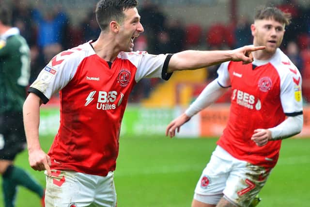 Loanee Jason Holt celebrates scoring for Fleetwood Town against Plymouth Argyle, the second of his two goals for the club.