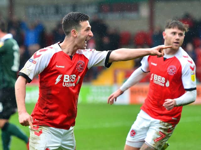 Loanee Jason Holt celebrates scoring for Fleetwood Town against Plymouth Argyle, the second of his two goals for the club.