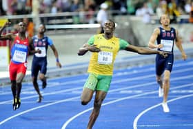 Jamaica's Usain Bolt sets a new World Record to win the Men's 200m Final during the IAAF World Championships at the Olympiastadion, Berlin on August 20, 2009