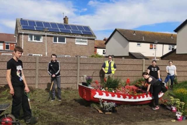 Anchorsholme councillor Paul Galley and teens taking part in Fleetwood Town Community Trust's NCS scheme transformed a patch of land in Fleetwood into a community garden.