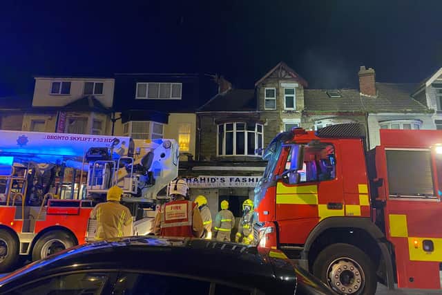 Fire crews tackle blaze at South Shore shop and flat