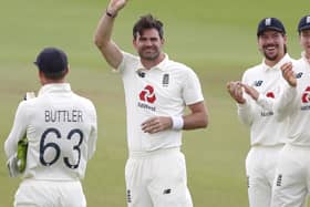 He's done it! Jimmy Anderson holds the ball with which he claimed his 600th Test victim