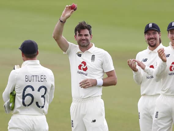 He's done it! Jimmy Anderson holds the ball with which he claimed his 600th Test victim