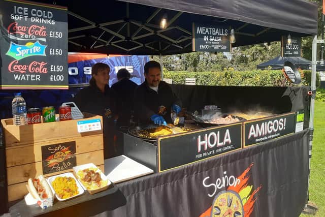 Paella, meatballs and chorizo hotdogs on sale