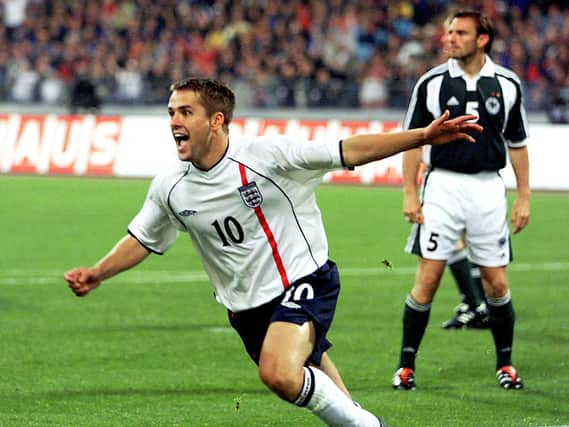 Michael Owen celebrates scoring his second goal against Germany
