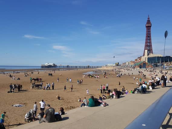 A busy beach and Promenade on the August bank holiday