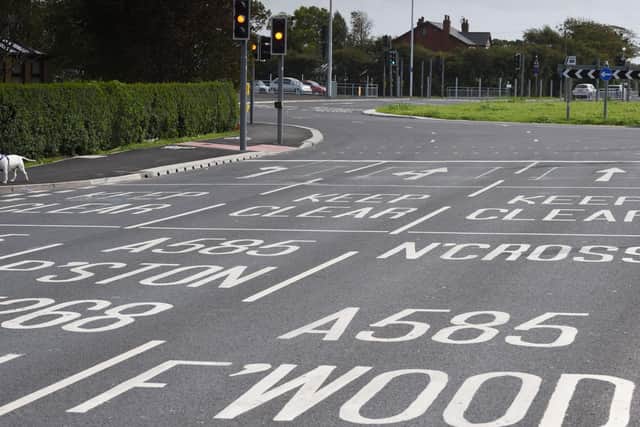 One of the issues motorists found with the new roundabout was the painted signs in each lane. Cars parked over them waiting at the lights made them impossible to read, motorists said. Photo: Daniel Martino for JPI Media.