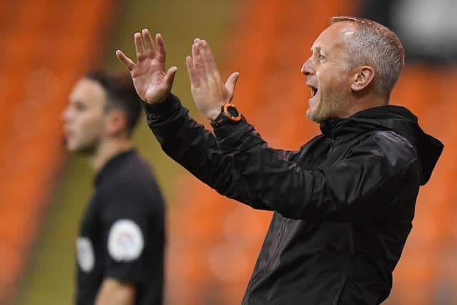 Neil Critchley barking instructions from the touchline
