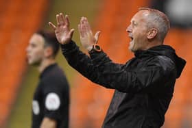 Neil Critchley barking instructions from the touchline