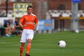 Ben Garrity will benefit greatly from his loan spell with Oldham says Blackpool boss Neil Critchley