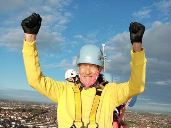 Ron Dagger shows his delight on reaching the top of The Big One