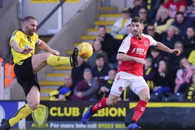 New Burton boss Jake Buxton on the ball for the Brewers against Fleetwood Town