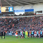 Blackpool's players will be back playing in front of a reduced number of fans tomorrow