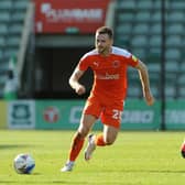 Ollie Turton in action for Blackpool against Plymouth last week