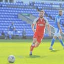 Fleetwood goalscorer Callum Camps in action during the dramatic defeat at Peterborough