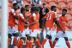 CJ Hamilton's double helped Blackpool to their first league win of the season