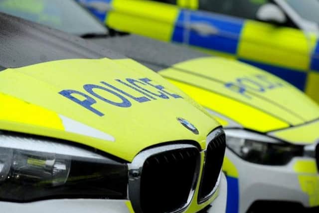 A police car was "significantly damaged" during a pursuit of a stolen car on the M55.