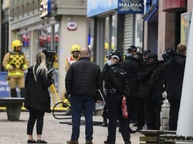 Armed police and specialist negotiators at the scene of the stand-off at Halifax bank in Church Street, Blackpool yesterday (Monday, September 28)
