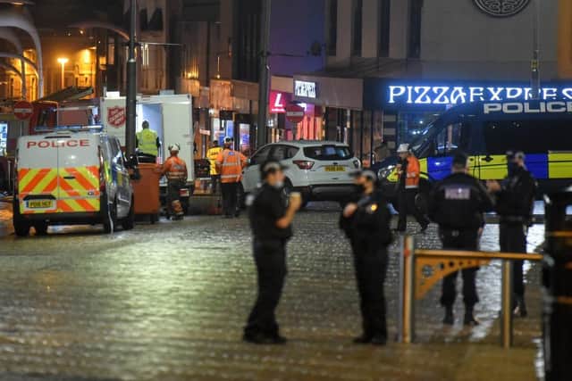 Emergency services remained at the scene, behind a police cordon in Church Street, until the man gave himself up at around 2am