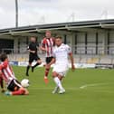 Goalscorer Kurt Willoughby in action for AFC Fylde against Altrincham