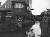 Canoeing in Hardhorn Road during torrential rain