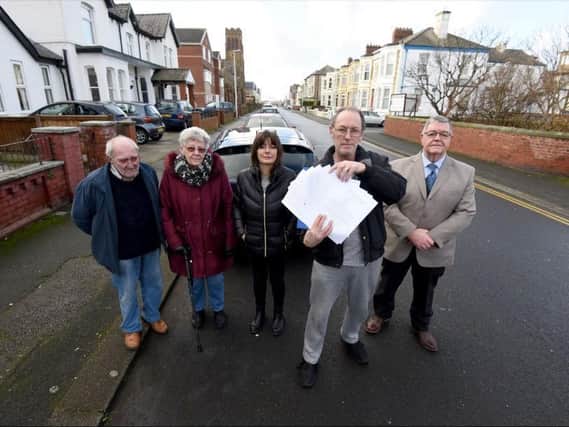 Joe Larkin, June Burgess, Kath Ferrier, Sean Hornby and Michael McDey with the petition for better parking they submitted in January